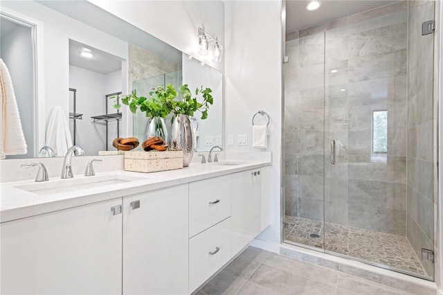 532 W Plaza Pl Unit 2, Tampa, FL 33602 - bathroom featuring double vanity, a stall shower, tile patterned flooring, baseboards, and recessed lighting