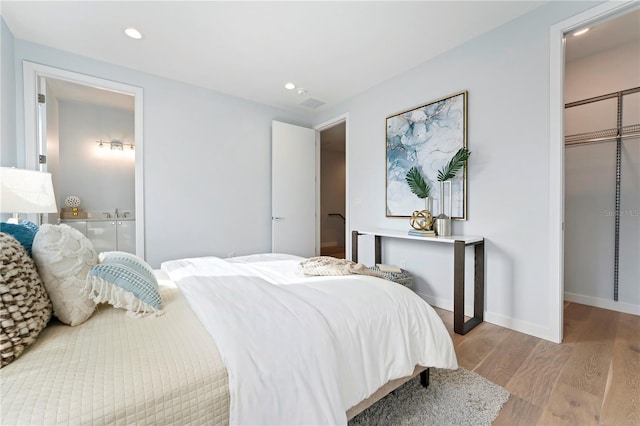 532 W Plaza Pl Unit 2, Tampa, FL 33602 - bedroom with wood finished floors, baseboards, and recessed lighting