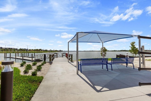 dock area with a water view