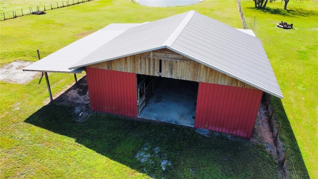 view of outdoor structure with a lawn