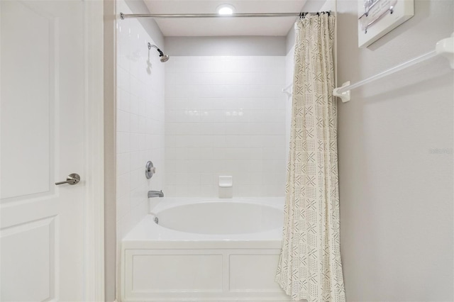 full bath featuring shower / bath combo with shower curtain