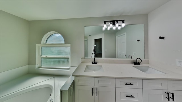 bathroom featuring vanity and a wealth of natural light