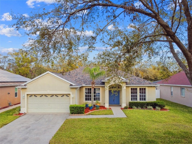 ranch-style house with a garage, a shingled roof, concrete driveway, stucco siding, and a front yard