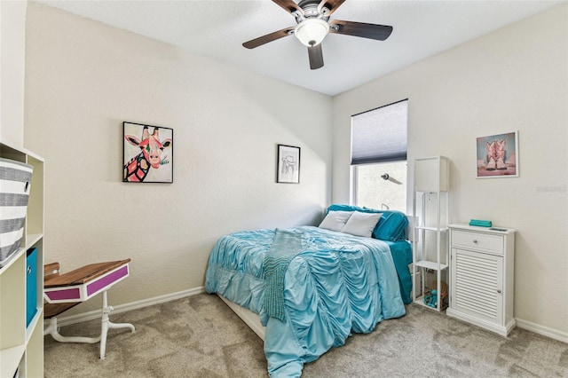 bedroom featuring a ceiling fan, carpet flooring, and baseboards