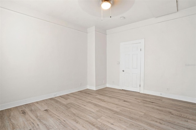 unfurnished room featuring light hardwood / wood-style floors and ceiling fan