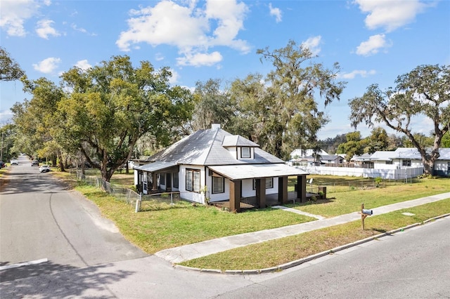 view of front of home with a front yard