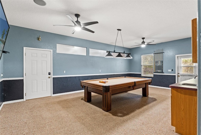 rec room with ceiling fan, carpet flooring, billiards, and a textured ceiling