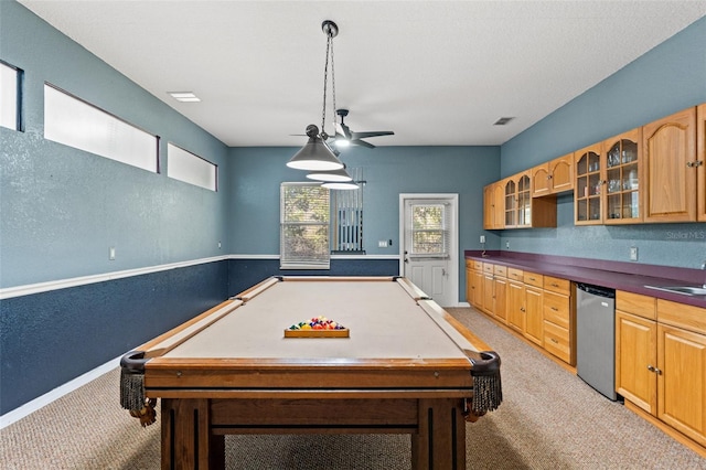 game room featuring sink and light colored carpet