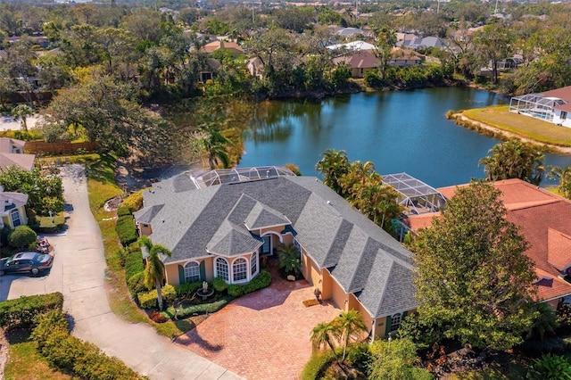 birds eye view of property featuring a water view