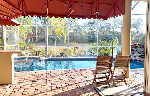 view of swimming pool featuring a pool with connected hot tub