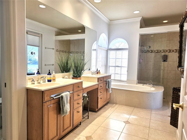 full bath featuring tile patterned floors, ornamental molding, a bath, and vanity