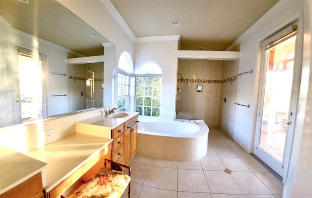 bathroom featuring vanity, a bath, tile patterned floors, walk in shower, and crown molding