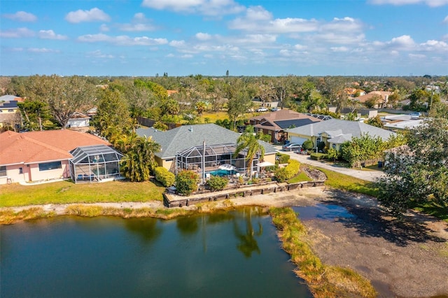 aerial view featuring a water view and a residential view