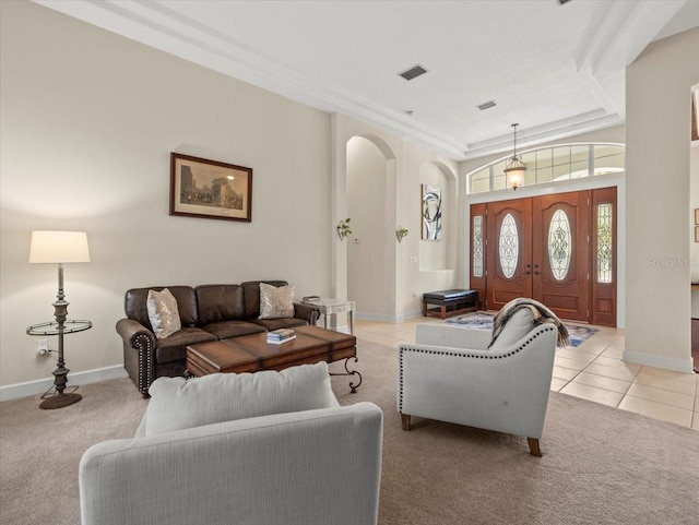 living room featuring light carpet