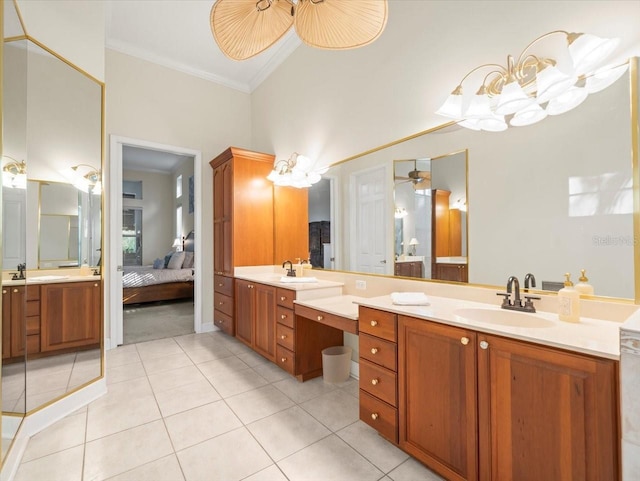 bathroom with ornamental molding, tile patterned floors, ceiling fan, and vanity