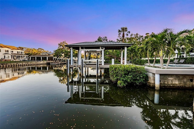 view of dock with a water view and boat lift