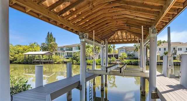 dock area featuring a water view and boat lift