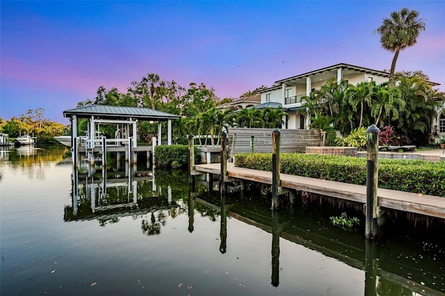 dock area with a water view