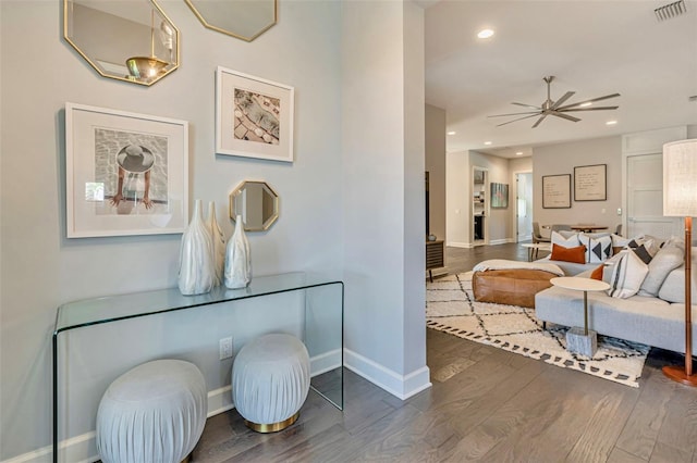 interior space with recessed lighting, visible vents, baseboards, and wood finished floors