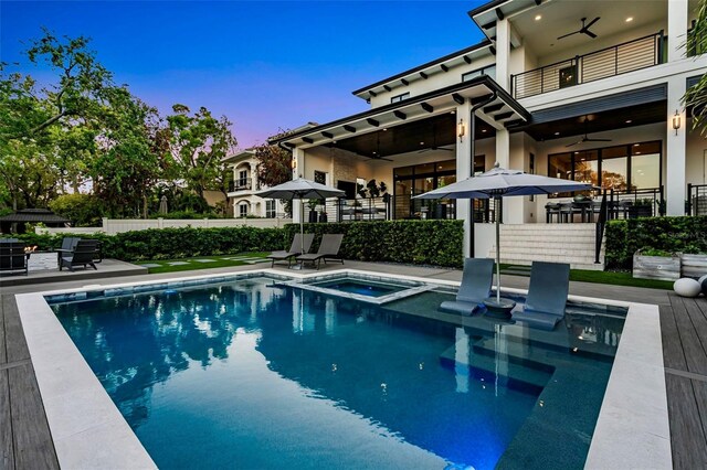 5004 S The Riviera, Tampa, FL 33609 - view of swimming pool with ceiling fan, a patio, and a pool with connected hot tub