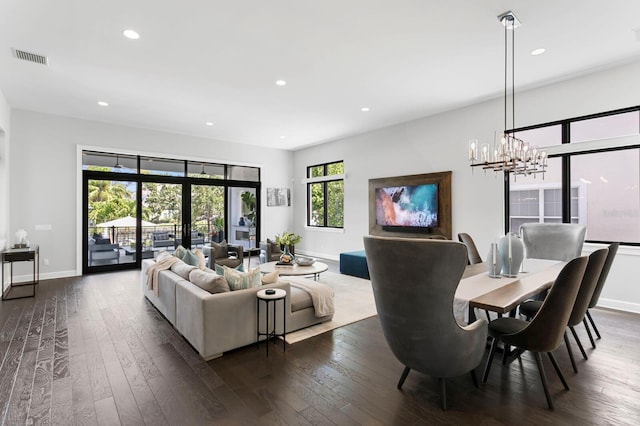 5004 S The Riviera, Tampa, FL 33609 - living area featuring a chandelier, dark wood-type flooring, recessed lighting, and baseboards