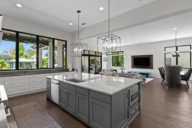 5004 S The Riviera, Tampa, FL 33609 - kitchen with a sink, a chandelier, gray cabinets, stainless steel appliances, and recessed lighting