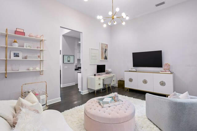 5004 S The Riviera, Tampa, FL 33609 - living area with a chandelier, wood finished floors, and baseboards