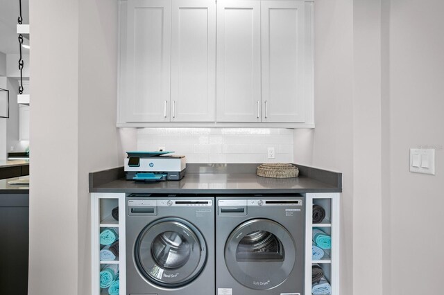 5004 S The Riviera, Tampa, FL 33609 - washroom featuring independent washer and dryer and cabinet space