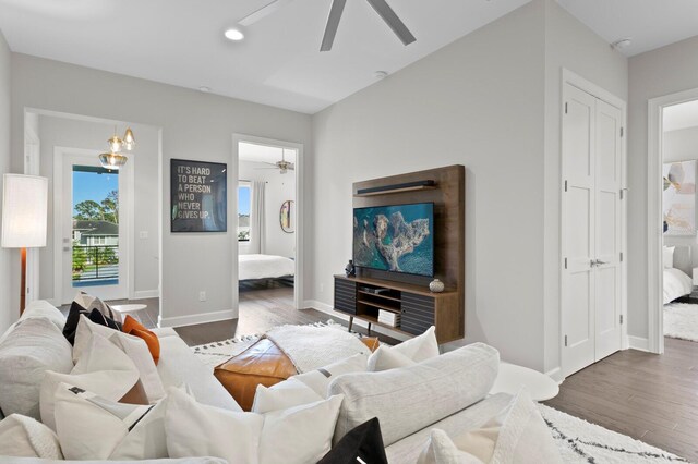 5004 S The Riviera, Tampa, FL 33609 - living room with ceiling fan, wood finished floors, baseboards, and recessed lighting