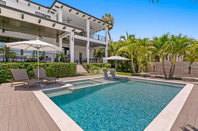 5004 S The Riviera, Tampa, FL 33609 - view of pool featuring ceiling fan, stairway, a patio, and a pool with connected hot tub