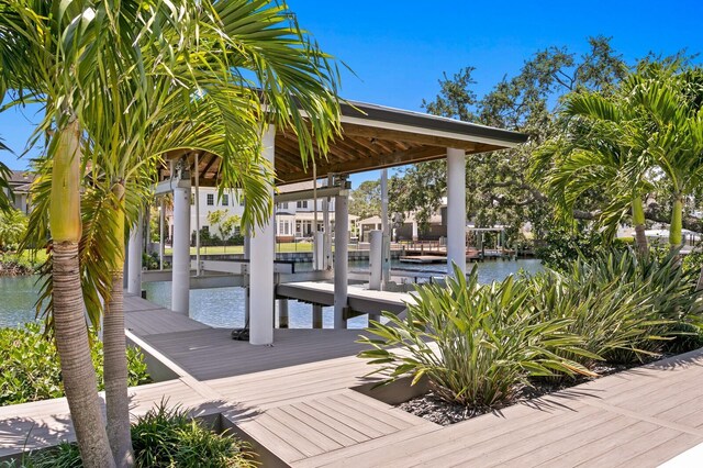 5004 S The Riviera, Tampa, FL 33609 - dock with boat lift and a water view