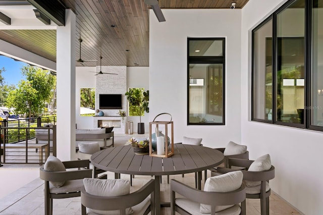 5004 S The Riviera, Tampa, FL 33609 - view of patio / terrace with a ceiling fan and outdoor dining area