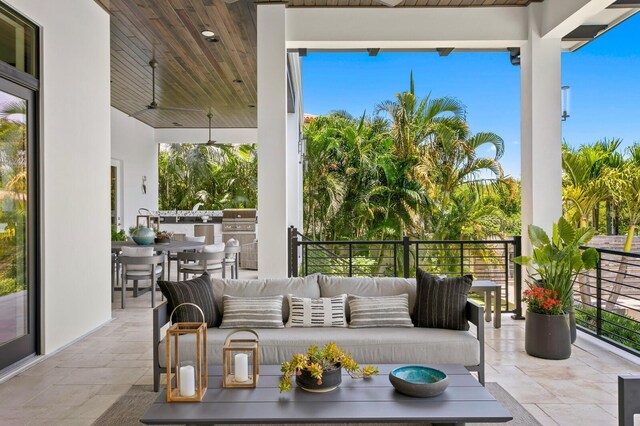 5004 S The Riviera, Tampa, FL 33609 - view of patio featuring an outdoor living space and outdoor dining area