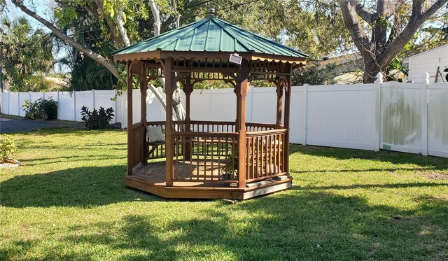 view of yard with a fenced backyard and a gazebo