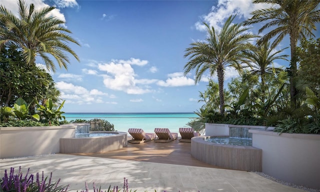 view of patio featuring a water view