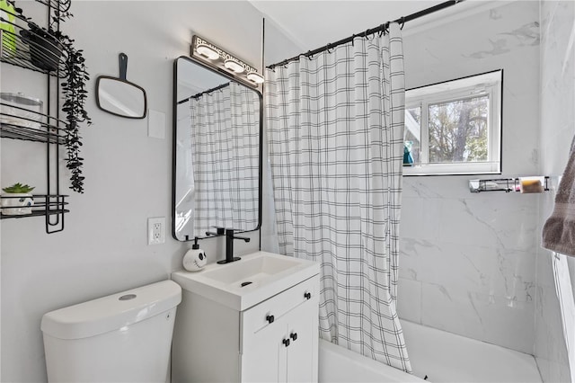 full bathroom with vanity, shower / bath combo with shower curtain, and toilet