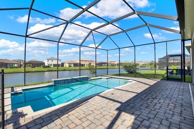 outdoor pool featuring a lanai, a residential view, a patio, and a water view