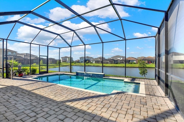 outdoor pool with glass enclosure, a residential view, and a patio area