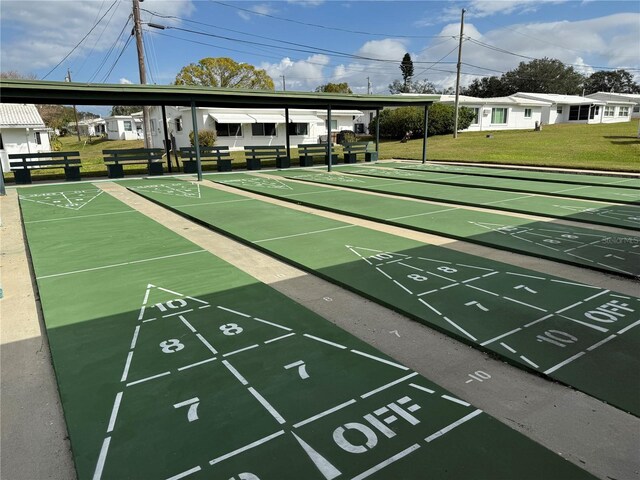 14132 89th Ave, Seminole, FL 33776 - surrounding community with shuffleboard and a yard