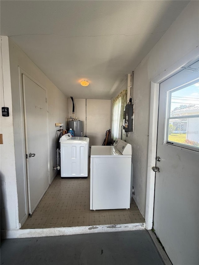 14132 89th Ave, Seminole, FL 33776 - laundry room with laundry area, electric panel, washer and clothes dryer, electric water heater, and light floors