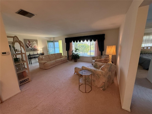 14132 89th Ave, Seminole, FL 33776 - living area featuring carpet flooring and visible vents