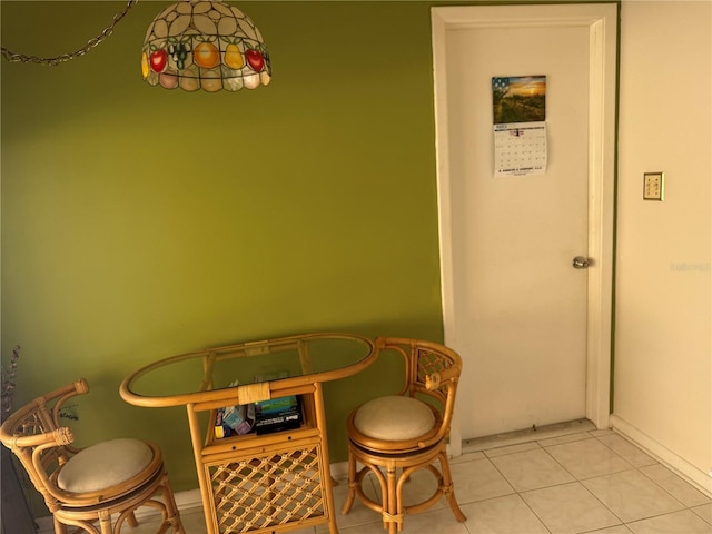 14132 89th Ave, Seminole, FL 33776 - dining space featuring light tile patterned floors