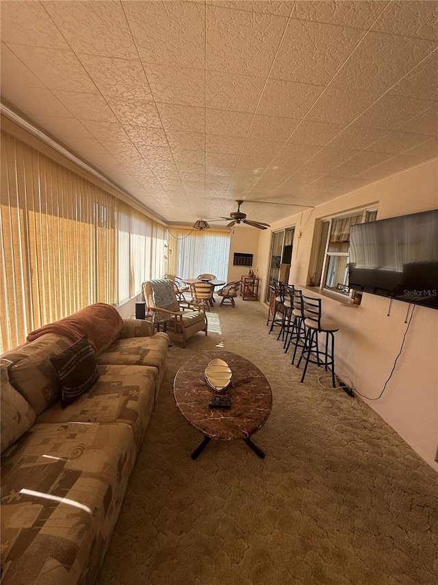 14132 89th Ave, Seminole, FL 33776 - living room with carpet and a ceiling fan