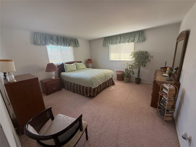 14132 89th Ave, Seminole, FL 33776 - bedroom featuring light carpet