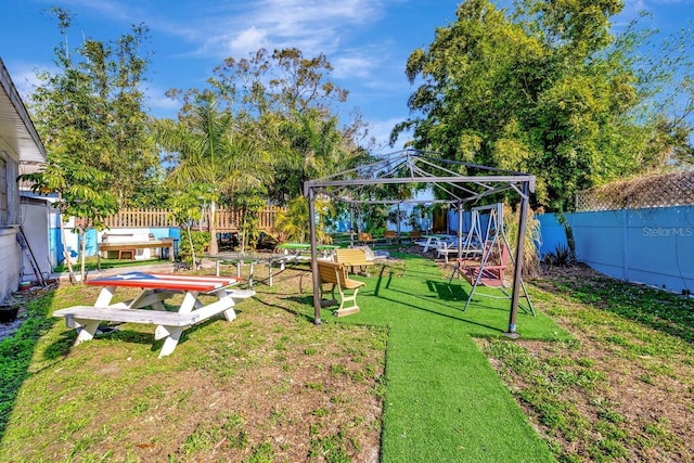 1011 W Columbus Dr, Tampa, FL 33602 - exterior space with a gazebo, a yard, and a fenced backyard