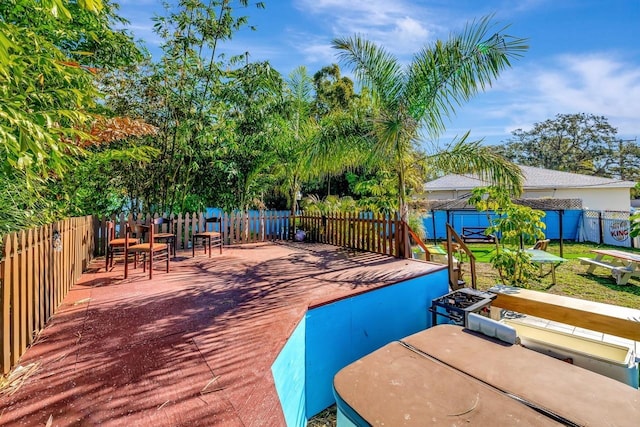 1011 W Columbus Dr, Tampa, FL 33602 - view of swimming pool with a patio, a fenced backyard, and an outdoor structure