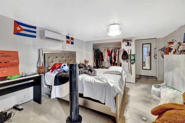 1011 W Columbus Dr, Tampa, FL 33602 - bedroom featuring a closet, a wall mounted AC, and tile patterned floors