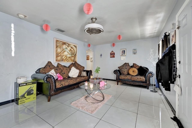 1011 W Columbus Dr, Tampa, FL 33602 - living area featuring visible vents, tile patterned floors, and baseboards