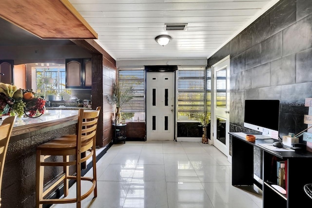 1011 W Columbus Dr, Tampa, FL 33602 - kitchen featuring light tile patterned flooring, visible vents, and plenty of natural light
