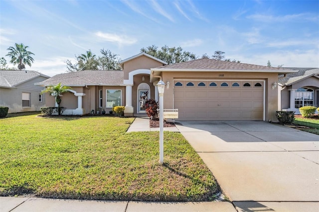 ranch-style house with an attached garage, driveway, a front lawn, and stucco siding